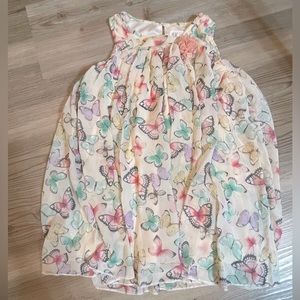 Butterfly sleeveless dress with flower accent